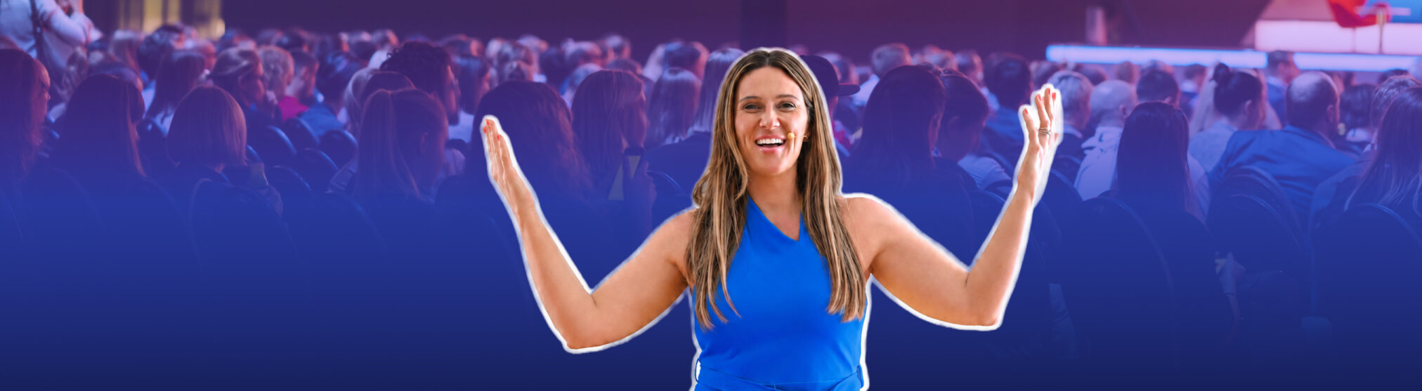 Emily Anne Page speaking on stage — keynote speaker on human connection and leadership